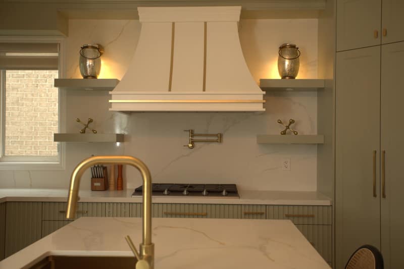 Kitchen before editing: dim exposure and a strong warm cast from the overhead lights